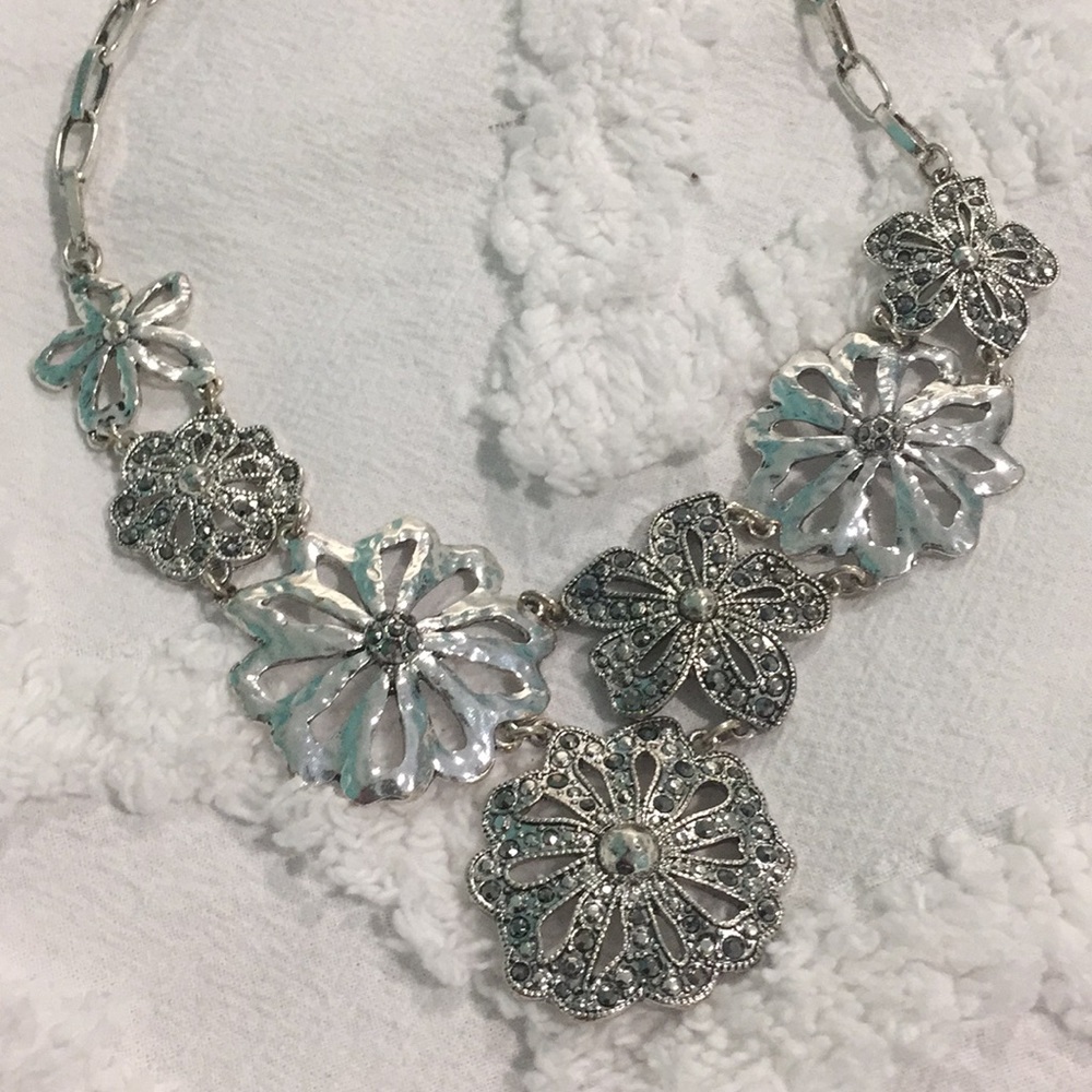 Trifari hammered flower necklace with dark gray / grey  stones